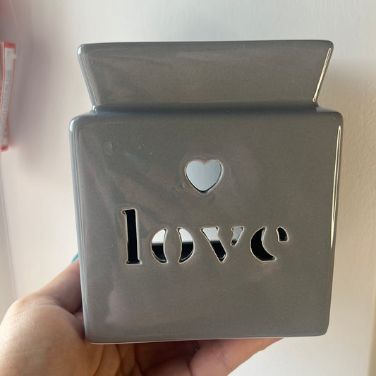 Grey love cut out oil burner